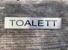 självhäftande skylt toalett palmetten
