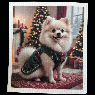 disktrasa med motiv av en Pomeranian framför julgranen