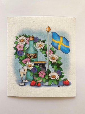disktrasa med motiv av en midsommarlunch snaps sill jordgubbar